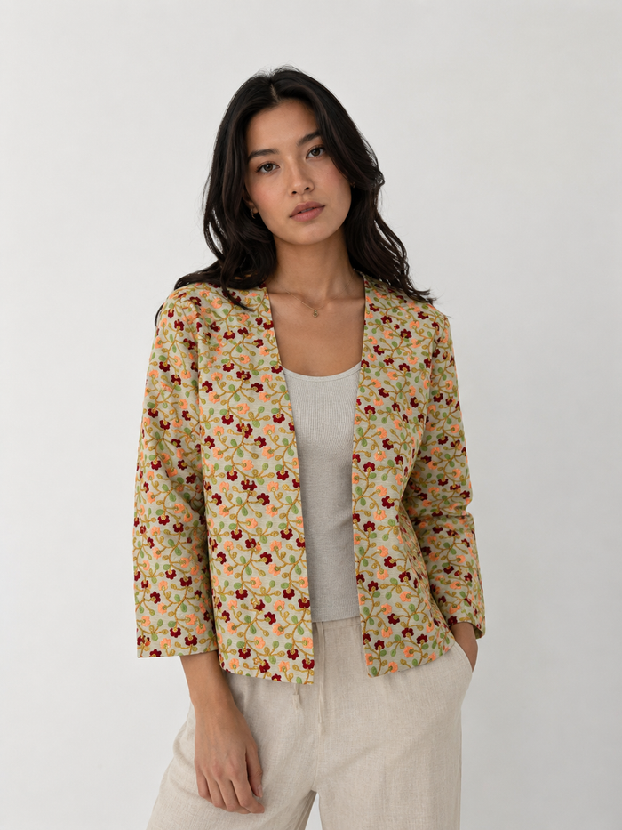 Open front floral embroidered raw silk jacket in off-white with green leaf embroidery, deep burgundy blooms and gold zari rope vines with sequin centres - Festival Jacket Green by Cienna Designs