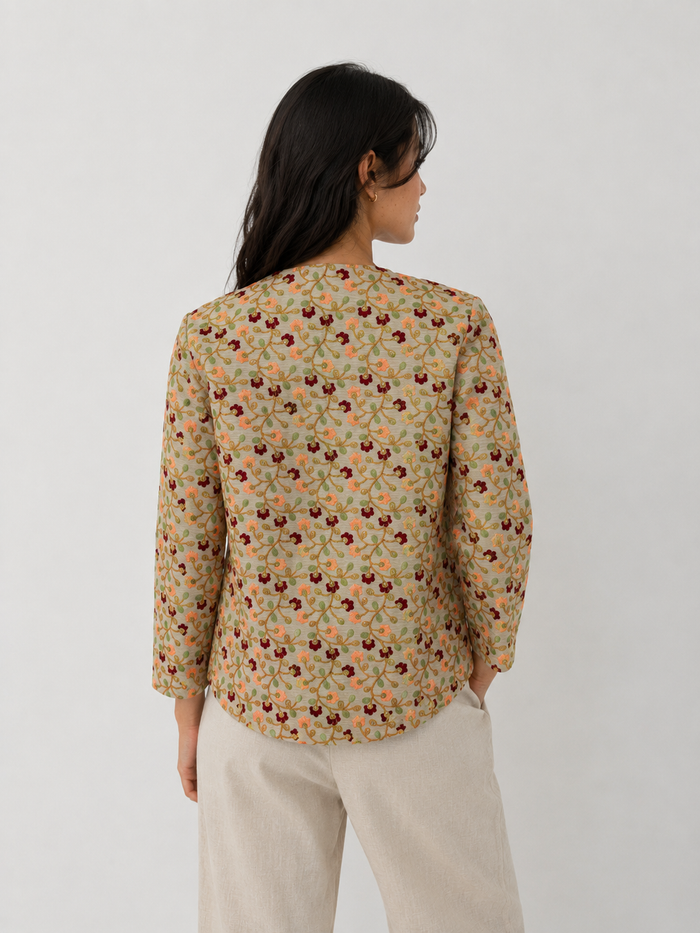 Open front floral embroidered raw silk jacket back view with green leaf embroidery, deep burgundy blooms and gold zari vines - Festival Jacket Green by Cienna Designs