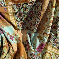 Sherwood Wrap Skirt styled for a day out, flowing paisley in cream gold and forest green — Cienna Designs