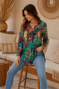 Stef Silk Shirt in semi-sheer silk-viscose blend with bold paisley and floral print in vibrant teal and burgundy, long relaxed fit with roll-tab sleeves and curved high-low hem - Cienna Designs