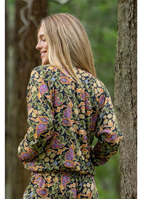 Verona Reversible Bomber showing reverse side, richly detailed paisley in navy sage and pink — Cienna Designs