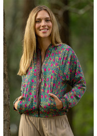 Verona Reversible Bomber in silk-polyester paisley, back view navy sage green and dusty pink — Cienna Designs